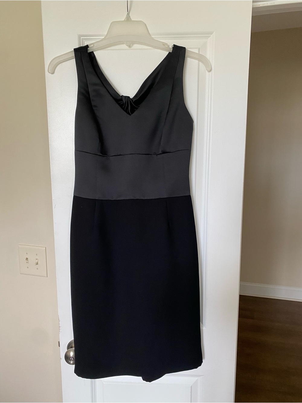 Satin twist back black cocktail dress